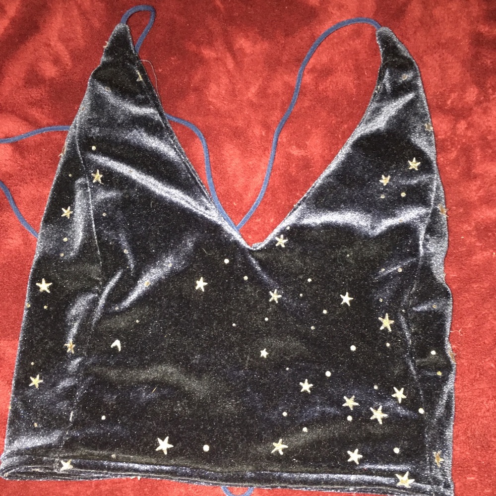 Blue with gold stars and open back